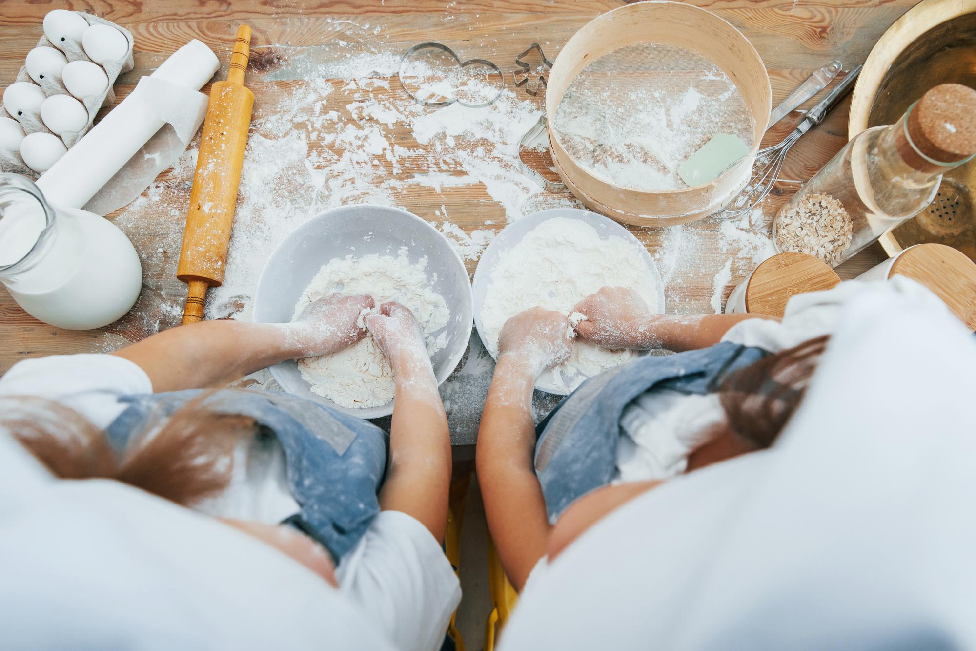 Hands kneading dough